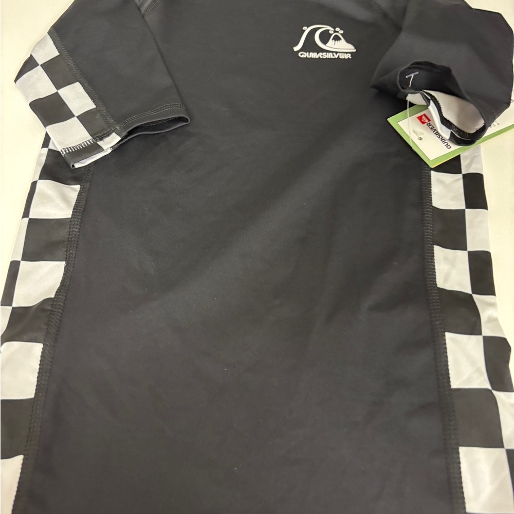 Quicksilver boys rash guard black and race check on sleeves